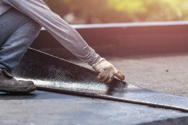 Professional Emergency Waterproofing technician working in Freehold, NJ